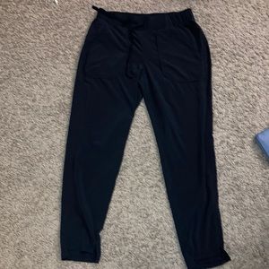 Black dry-fit sweatpants, loose fitting
